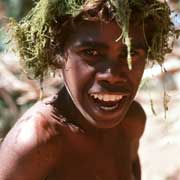 Boy with weeds