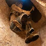 Mine worker in a shaft