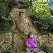 Girl at Aboriginal sculpture