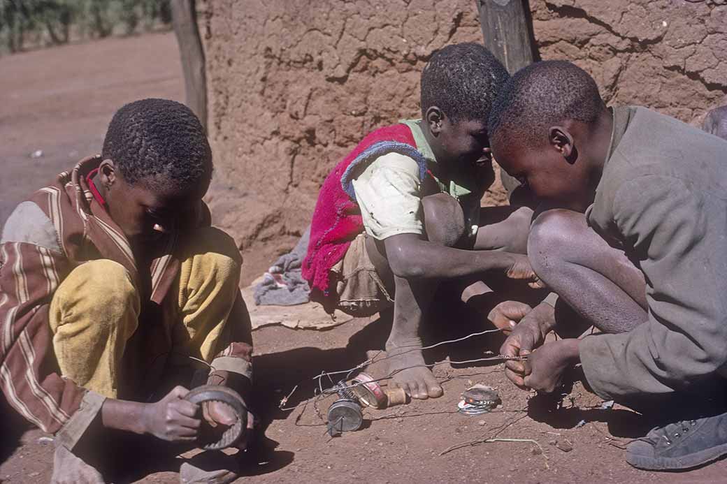 Boys making toy cars, Serowe