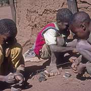 Boys making toy cars, Serowe