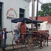 Loading a horse drawn cart, Bayamo