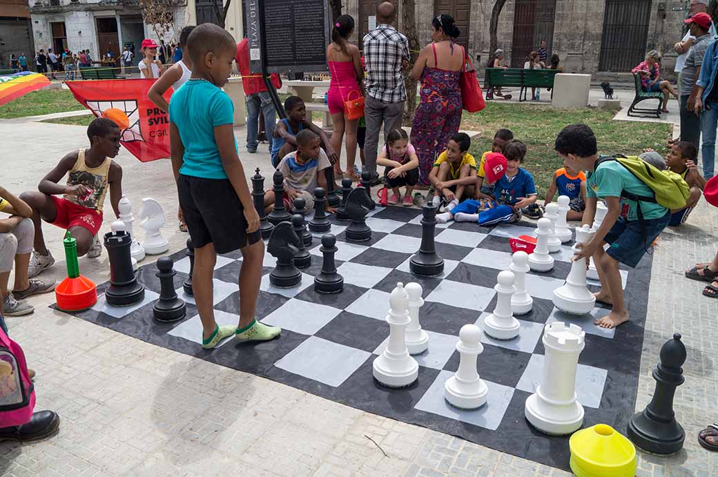 Boys playing chess, Havana