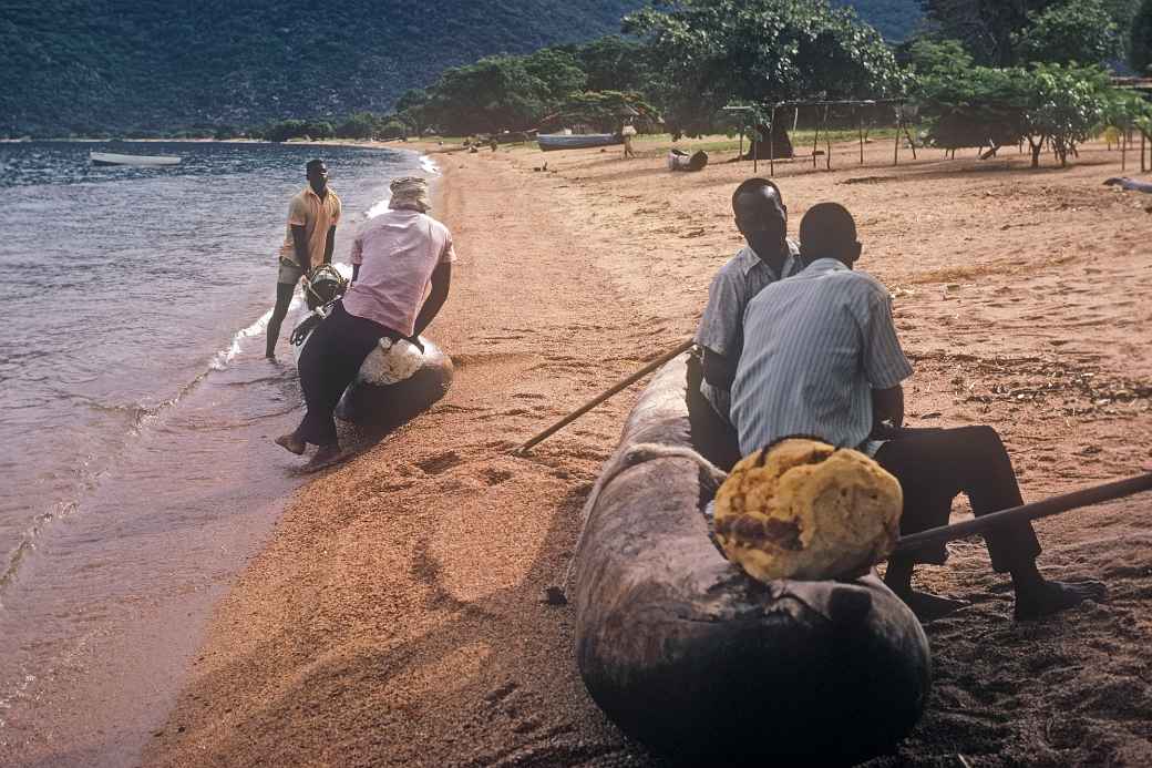 Men with canoes