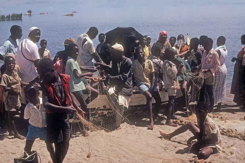 Men and boys, fishing boat