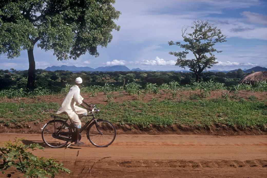 Yao man on a bike