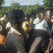 Boys playing on calabashes