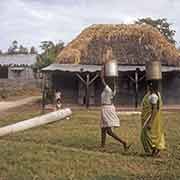 Women carrying water, Belle Mare