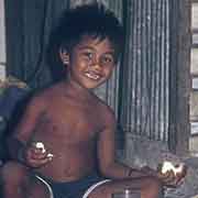 Boy eating bread