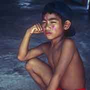 Young boy in red thu