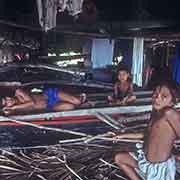 Boys in canoe house