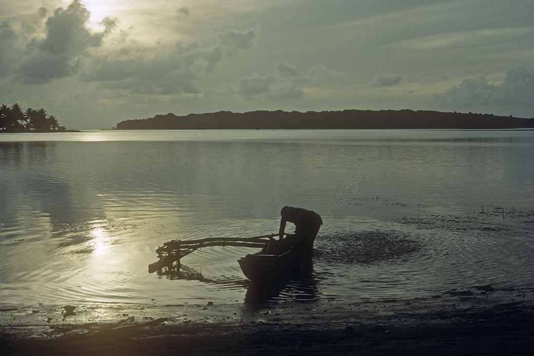 Bailing out a canoe