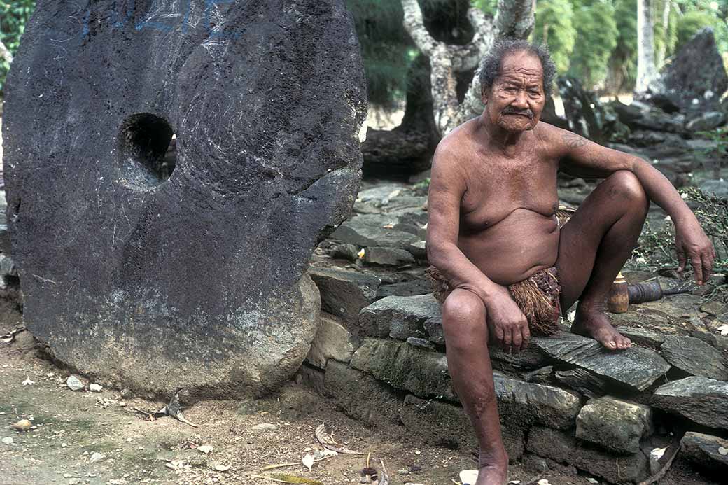 Man and raay stone coin