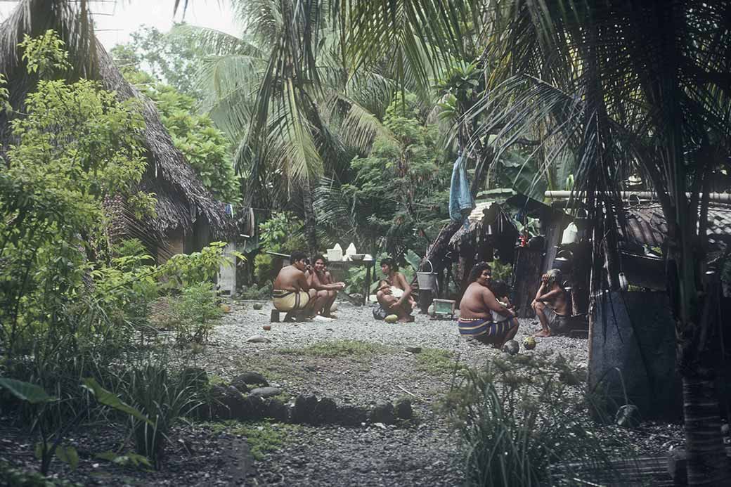 Women, traditional house, Satawal