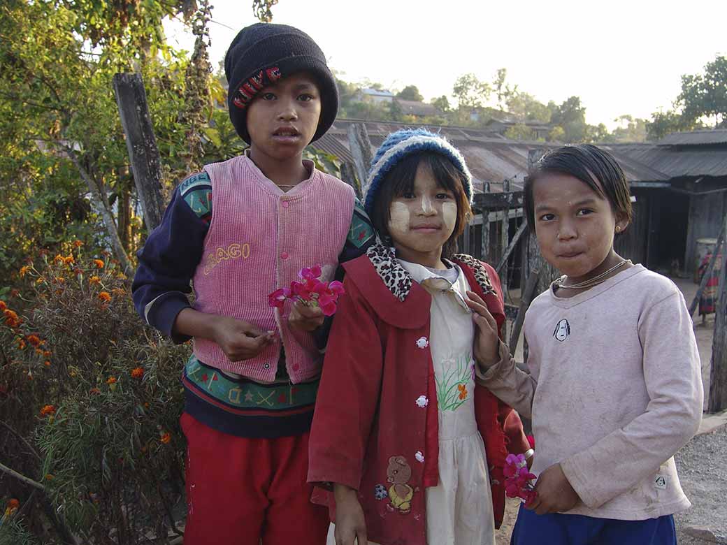 Girls offering flowers