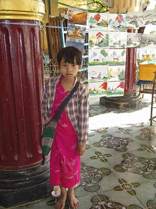 Girl selling postcards