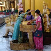 Devotees pouring water