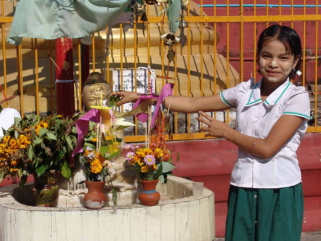 Girl with offerings