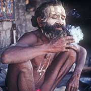 Sadhu smoking a cigarette