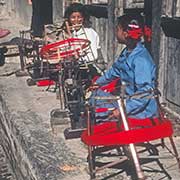 Girls spinning wool