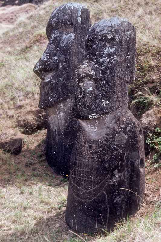 Two moai, with petroglyph