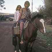 Boy and girl on a horse