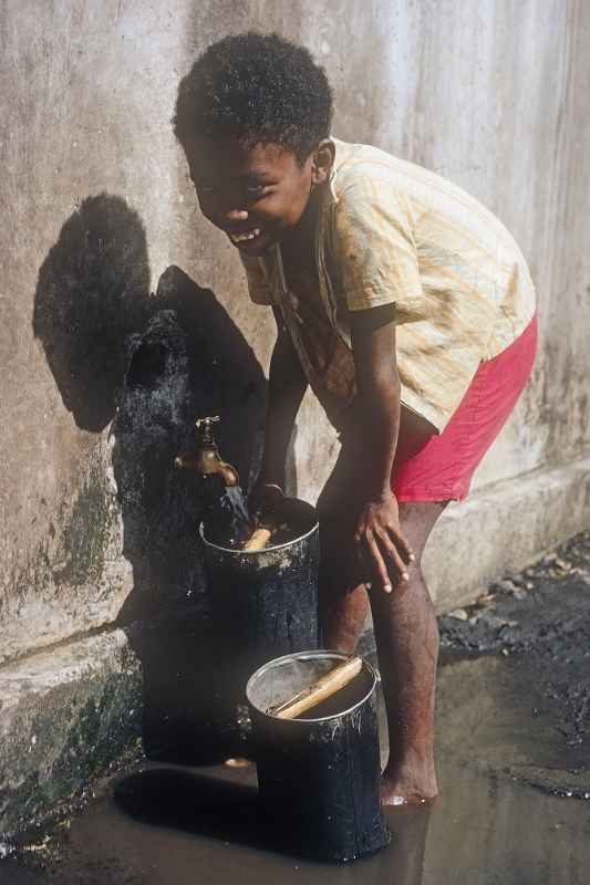 Boy fetching water