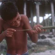 Boy with blowgun