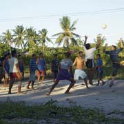 Playing volleyball