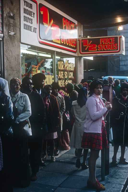 Waiting in line at a shop