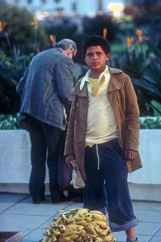 Boy selling bananas