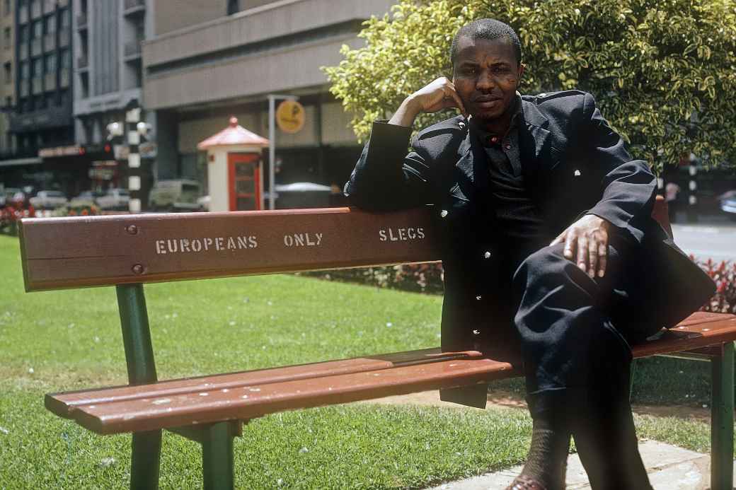 African man on a bench