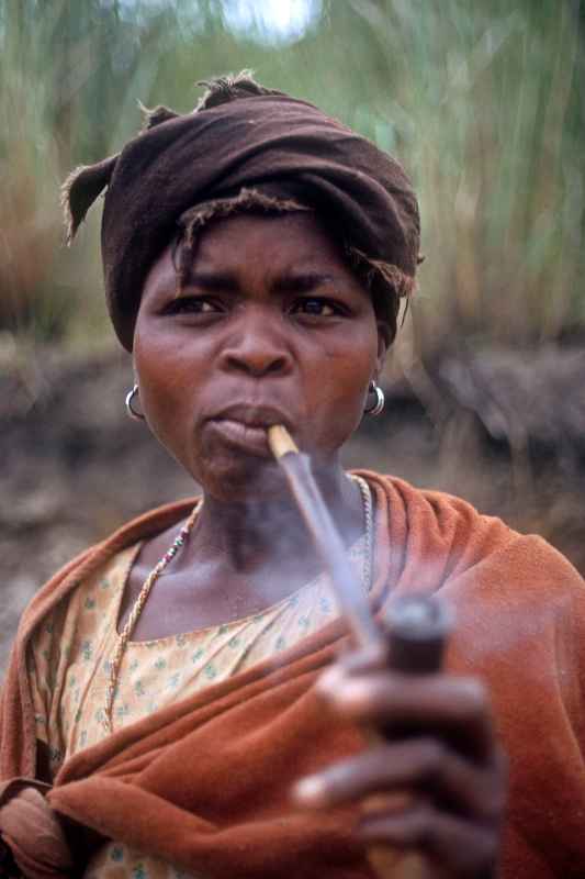 Woman smoking her pipe