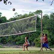 Boys playing volleyball, Palumeu