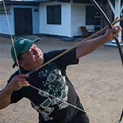 Demonstrating bow and arrow