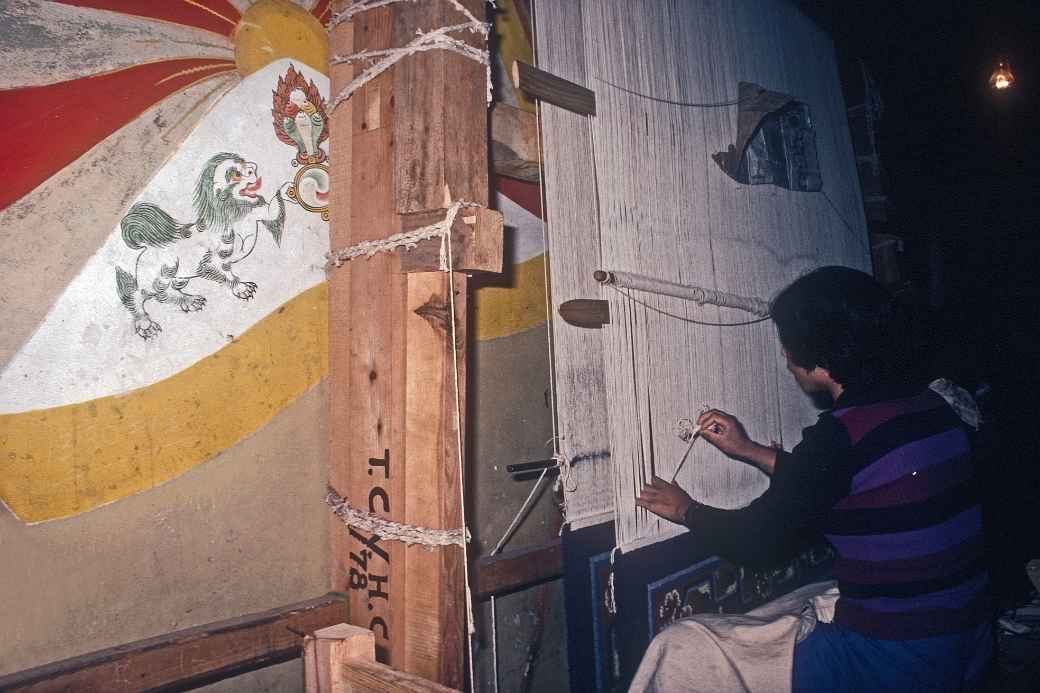 Weaving a carpet, McLeod Ganj