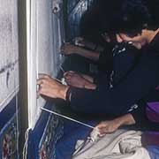 Weaving a carpet, McLeod Ganj