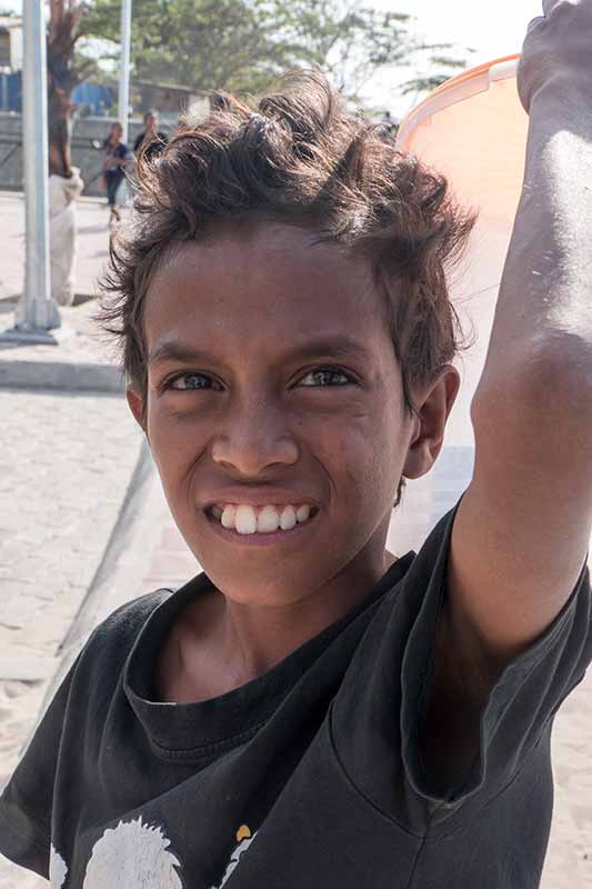 Boy selling snacks