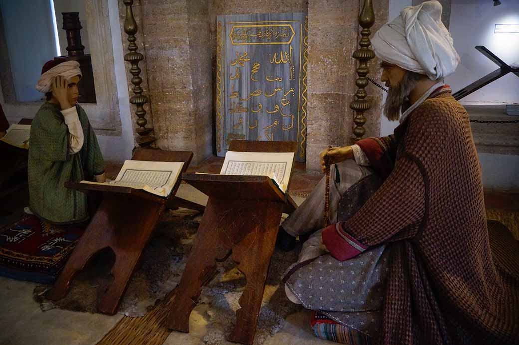 Display of a boy being taught