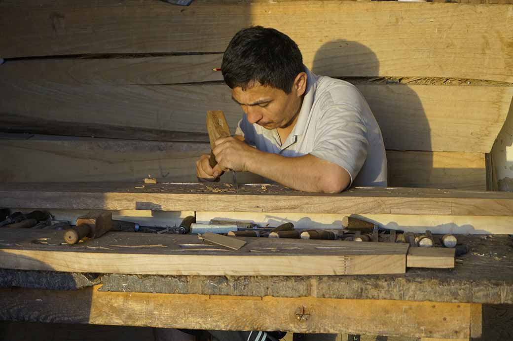 Woodcarver at work