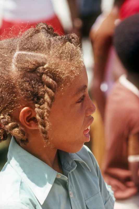 Boy with plaited hair