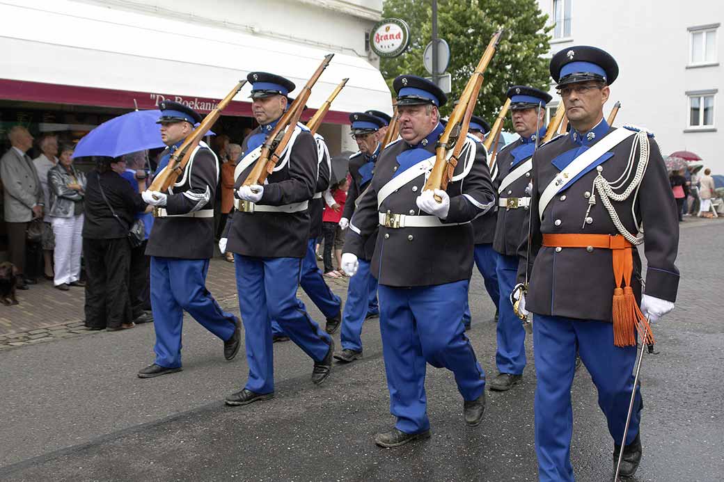 'Rifle carriers”  marching