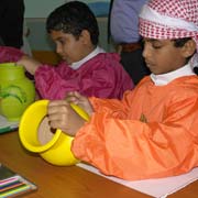 Boys with clay pots